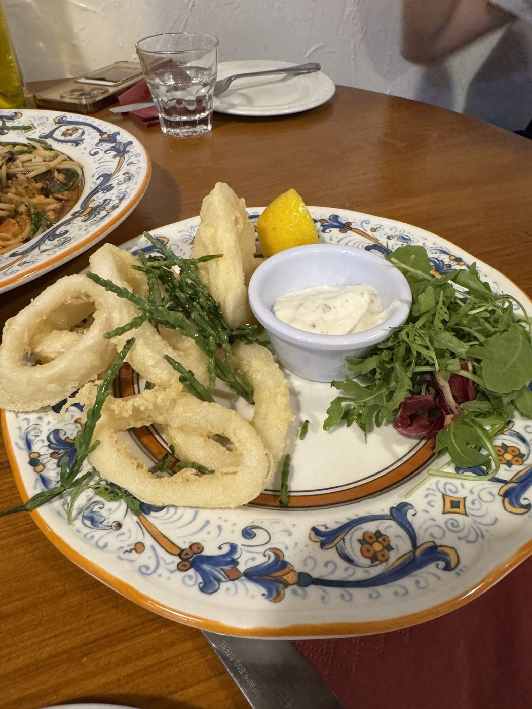 Fried calamari rings with aioli, rocket and lemon
